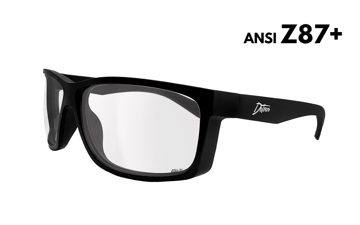 Black-framed eyeglasses with clear lenses on a white background.
